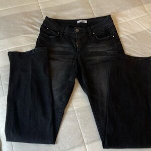 Distressed straight leg bootie-lifting jeans :)